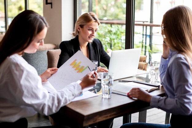 Free photo high angle team meeting with women