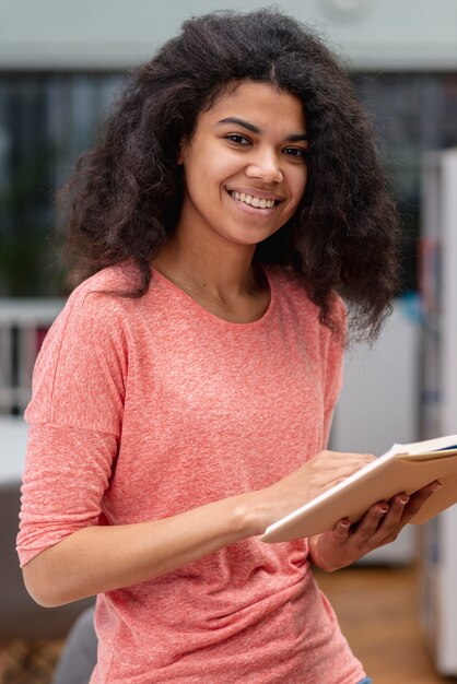 High angle teenage girl reading