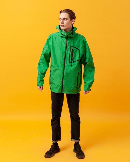High angle teenager with green jacket