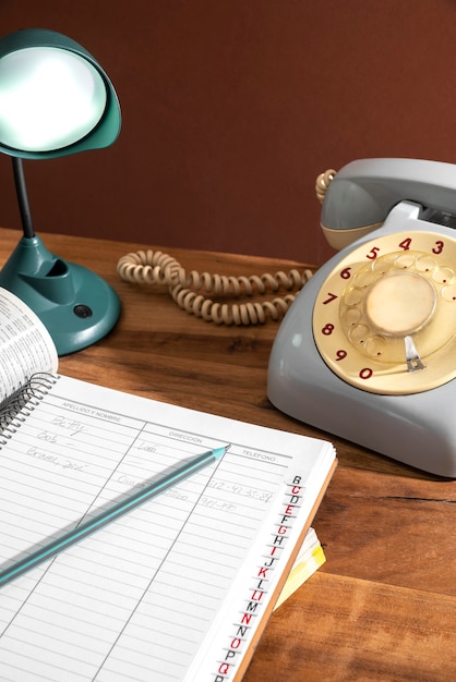 High angle telephone and book assortment