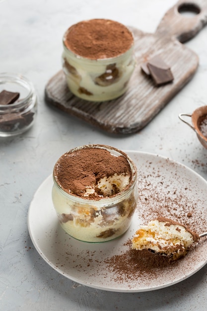 High angle tiramisu in small jar