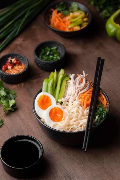 Free photo high angle of traditional asian dish with eggs