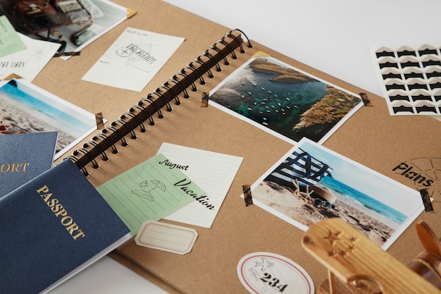 High angle traveling scrapbook and passports