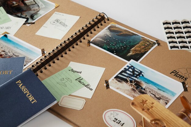 High angle traveling scrapbook and passports