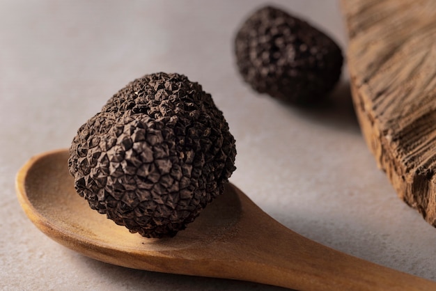 High angle truffle on wooden spoon