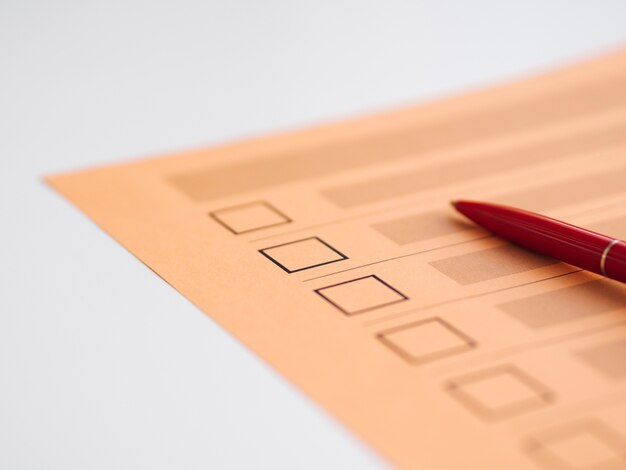 High angle uncompleted voting questionnaire close-up