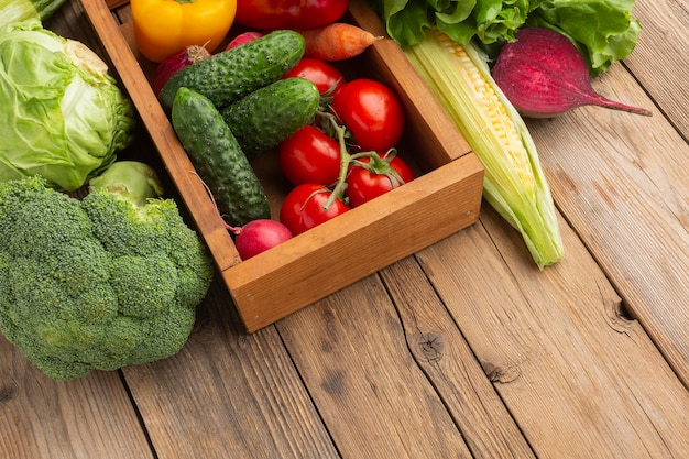 High angle vegetables on wooden table