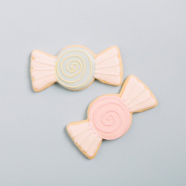 High angle view of chocolate shape fresh cookies on grey background