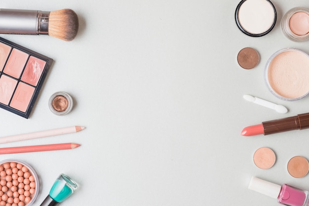 High angle view of cosmetic products on white surface