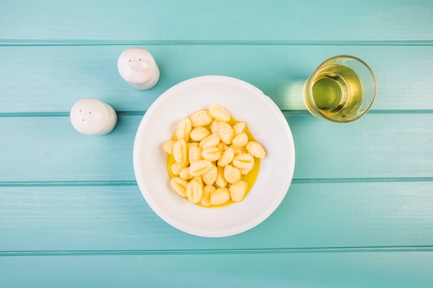 High angle view of delicious gnocchi pasta on desk