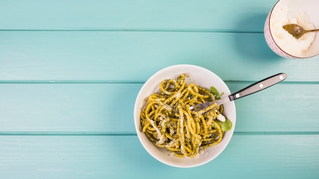 High angle view of delicious spaghetti on desk