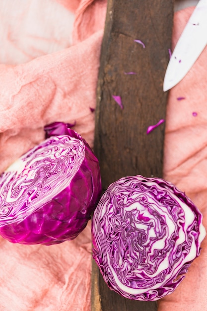 High angle view of halved purple cabbage