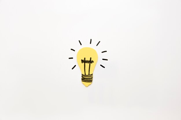 High angle view of illuminated light bulb on white background