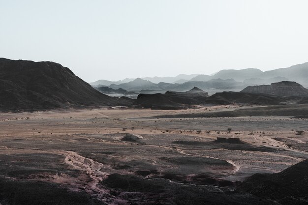 High angle view of the magnificent desert surrounded by hills and mountains