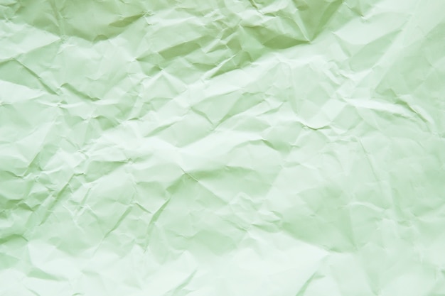 Бесплатное фото Высокий угол зрения зеленой бумаги текстурированный фон