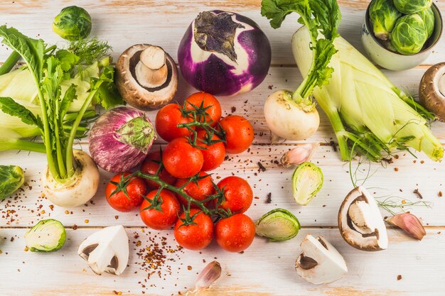 High angle view of raw vegetables on wooden surface