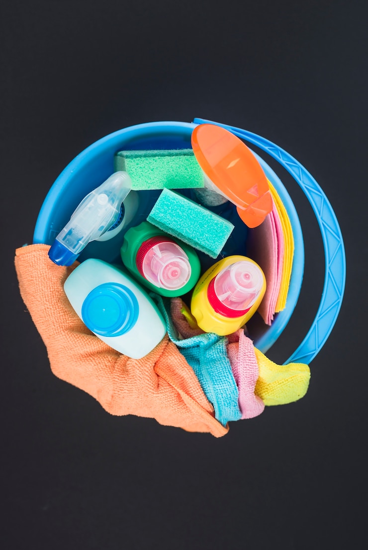 Free Photo high angle view of various cleaning equipments in basket