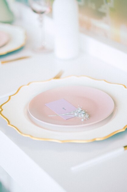 High angle view wedding table with plates . vertical