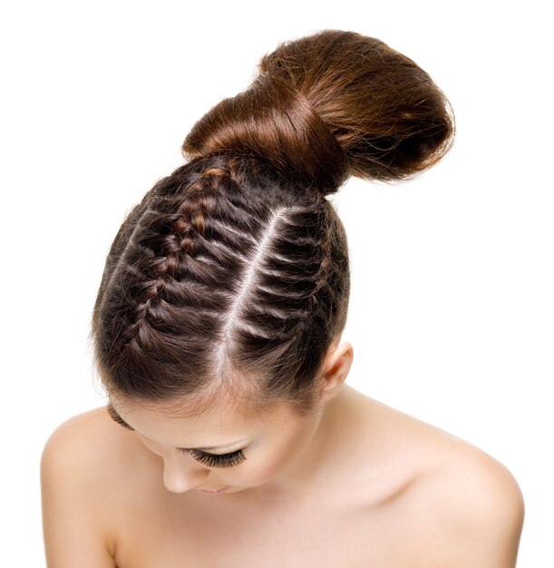 High angle view of a woman's head with beauty pigtails.