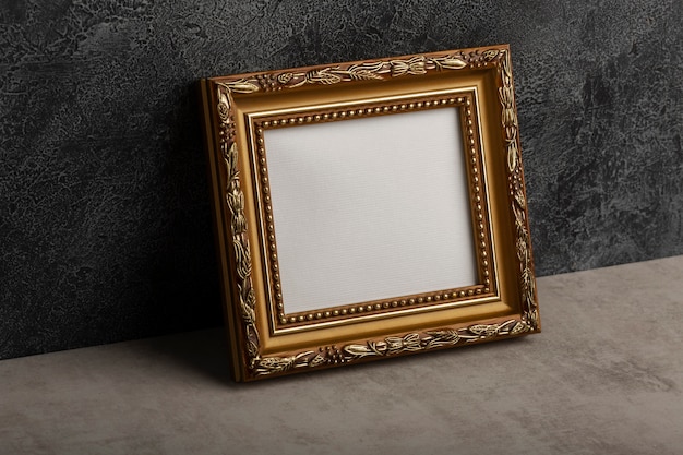 Free photo high angle vintage frame with stucco background