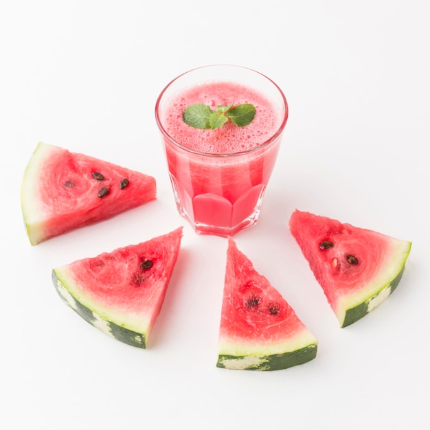 Free photo high angle of watermelon cocktail glass with copy space