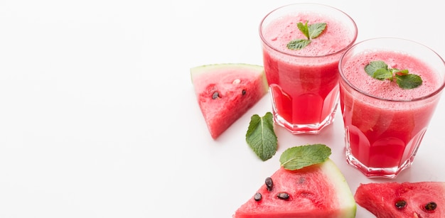 High angle of watermelon cocktail glasses with copy space