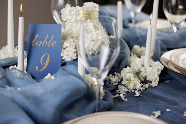 High angle wedding table number with candle