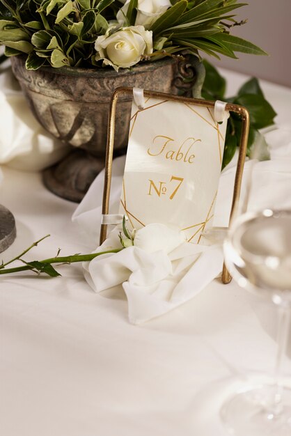 High angle wedding table number with flowers