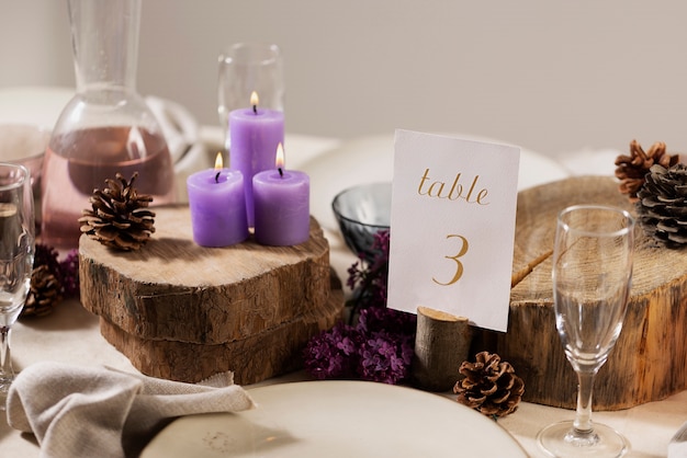 Free photo high angle wedding table with pine cones