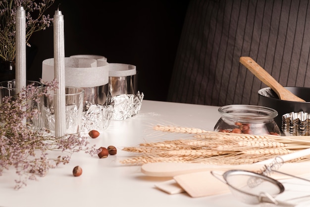 High angle of wheat with chestnuts and pans