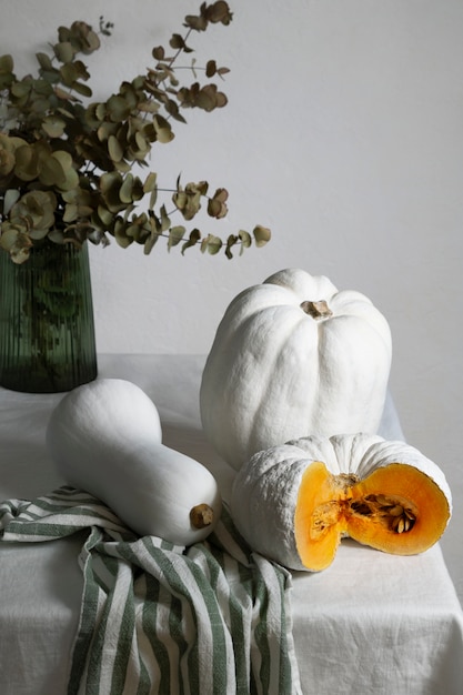 High angle white pumpkins arrangement on table