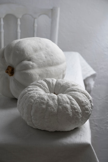 High angle white pumpkins on table