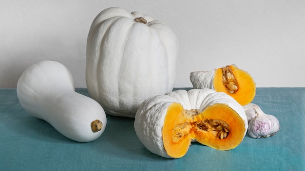 High angle white pumpkins and wall