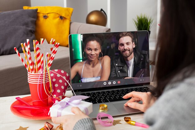 High angle woman celebrating with laptop