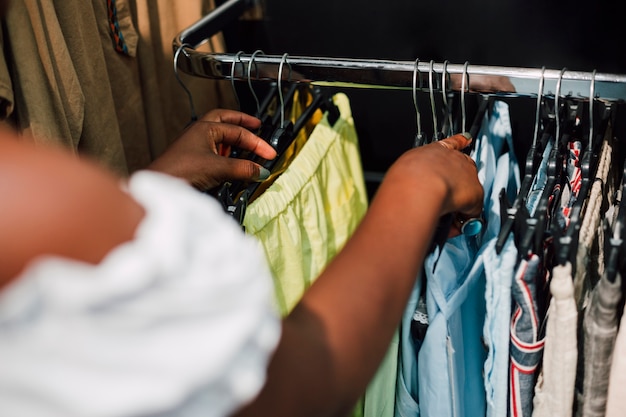 High angle woman in clothing store