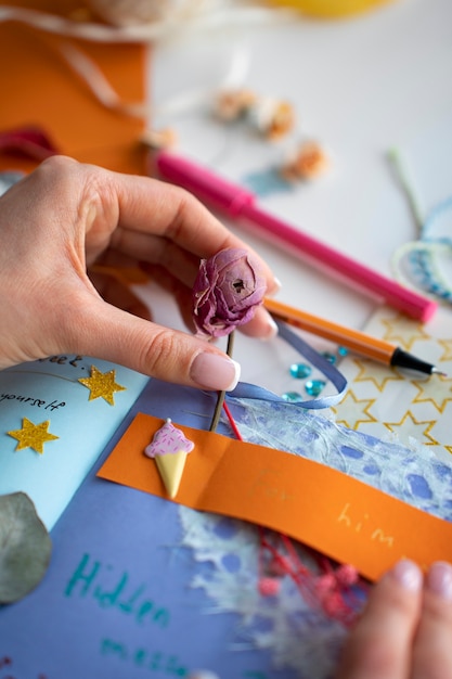 High angle woman doing creative journaling