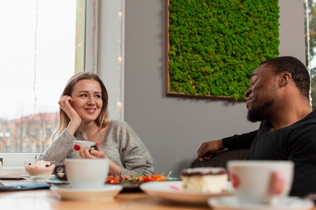 High angle woman and man at restaurant