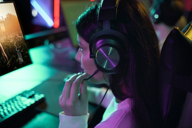 High angle woman playing videogame