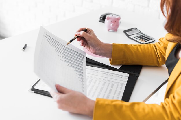 High angle woman revising documents