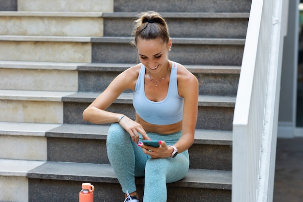 High angle woman sitting on stairs