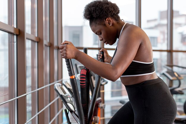 High angle woman on treadmill at gym