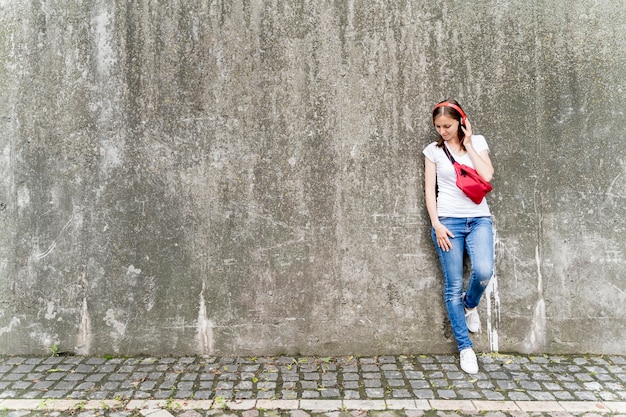 High angle woman with headphones