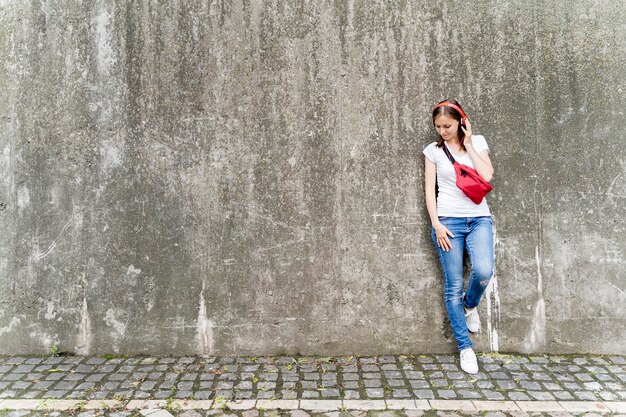 High angle woman with headphones