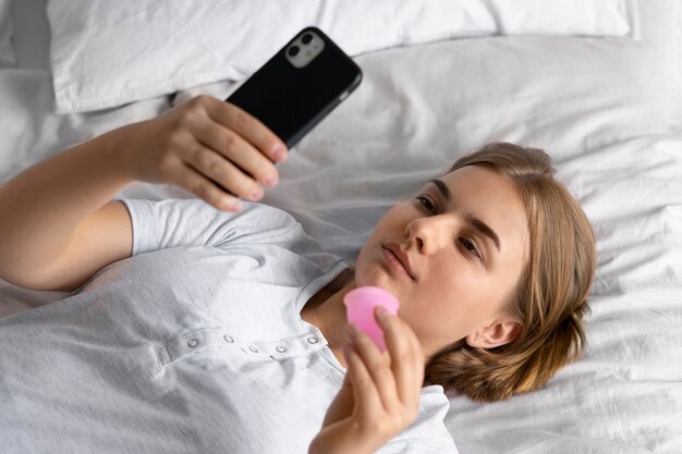 High angle woman with menstrual cup