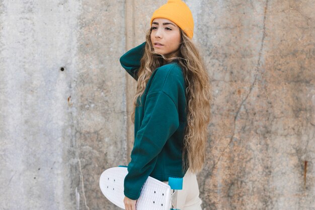 High angle woman with skateboard