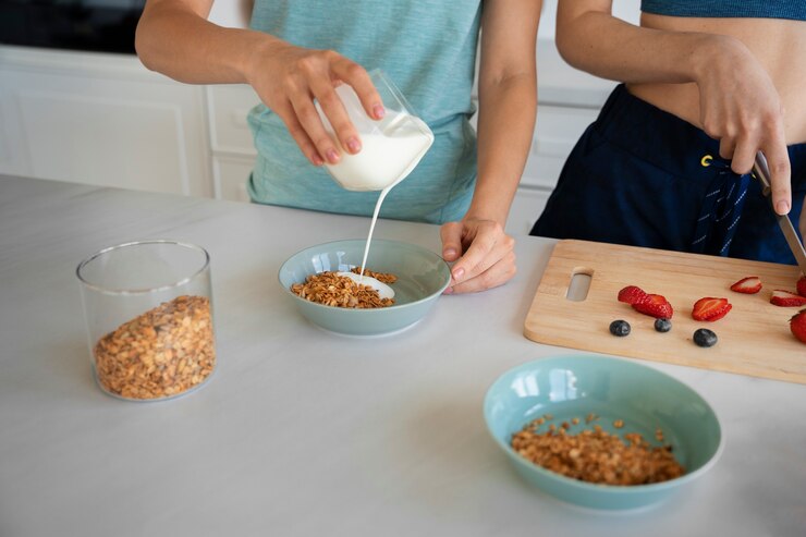 High angle women preparing healthy meals