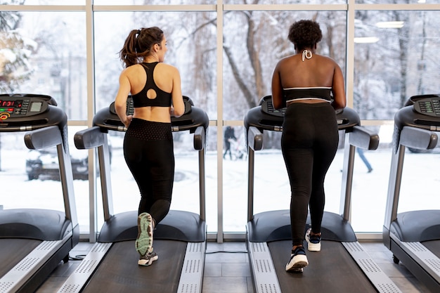 High angle women working on treadmill