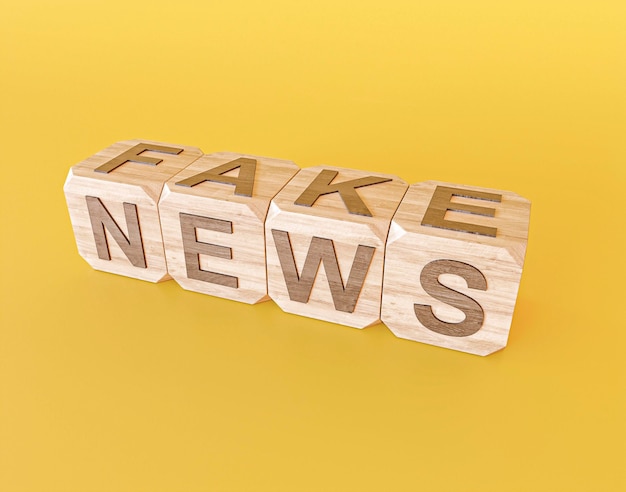 High angle of wooden cubes with fake news