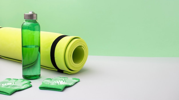 High angle yoga mat and water bottle