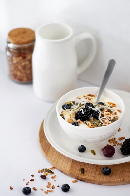 High angle yogurt bowl with fruits and cereals